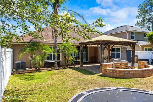 217 Willow Winds Pkwy, Saint Johns, FL 32259 - rear view of house featuring a gazebo, cooling unit, a patio area, stucco siding, and a hot tub