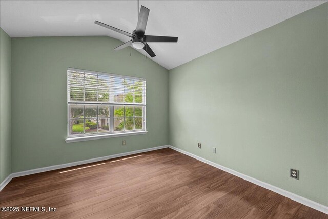 7990 Baymeadows Rd Unit 1305, Jacksonville, FL 32256 - unfurnished room featuring ceiling fan, wood finished floors, lofted ceiling, and baseboards