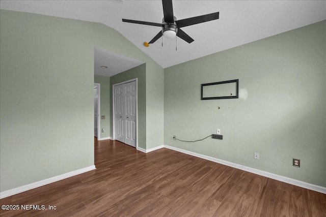 7990 Baymeadows Rd Unit 1305, Jacksonville, FL 32256 - unfurnished room with vaulted ceiling, a ceiling fan, wood finished floors, and baseboards