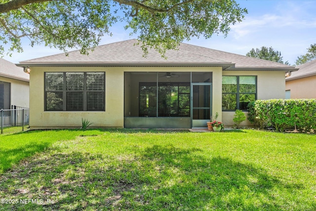 153 Hammocks Landing Dr, Ponte Vedra, FL 32081 - rear view of house with a sunroom, stucco siding, and roof with shingles