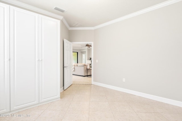 153 Hammocks Landing Dr, Ponte Vedra, FL 32081 - unfurnished bedroom with crown molding, baseboards, and light tile patterned floors