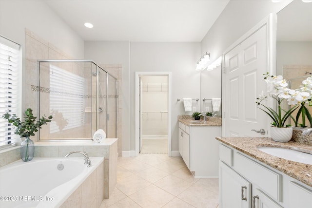 153 Hammocks Landing Dr, Ponte Vedra, FL 32081 - bathroom featuring a shower stall, a bath, two vanities, and plenty of natural light