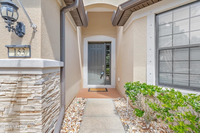 153 Hammocks Landing Dr, Ponte Vedra, FL 32081 - doorway to property featuring stucco siding