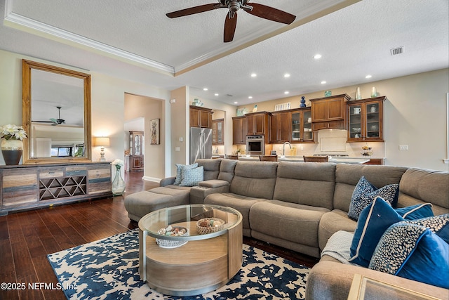 31 Port Ave, Saint Johns, FL 32259 - living area featuring a ceiling fan, a textured ceiling, crown molding, recessed lighting, and dark wood finished floors