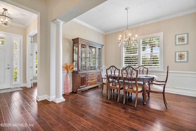 31 Port Ave, Saint Johns, FL 32259 - dining room with a chandelier, ornate columns, ornamental molding, and dark wood finished floors