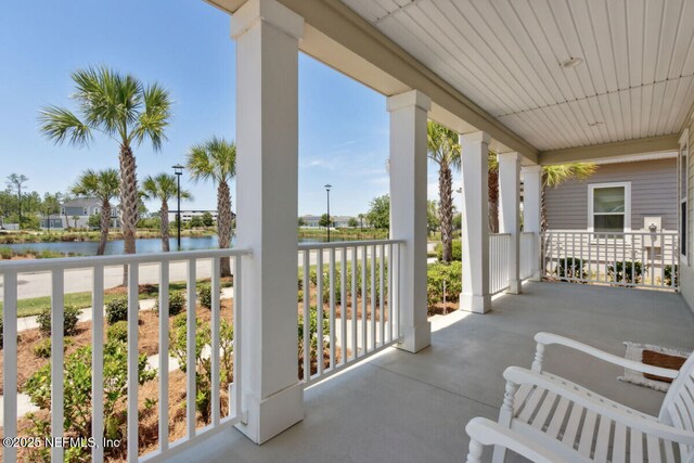 250 Ponder Cir, Yulee, FL 32097 - view of patio featuring a porch and a water view