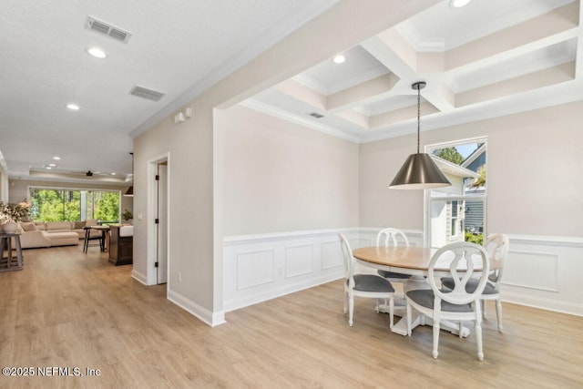 250 Ponder Cir, Yulee, FL 32097 - dining area featuring healthy amount of natural light, recessed lighting, ornamental molding, light wood-style floors, and coffered ceiling