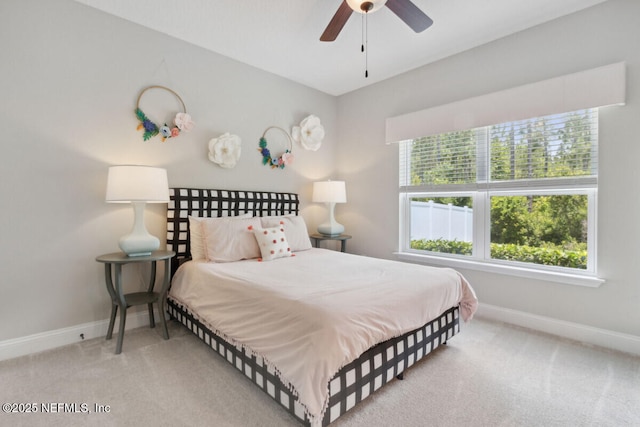 250 Ponder Cir, Yulee, FL 32097 - bedroom with baseboards, carpet floors, and a ceiling fan