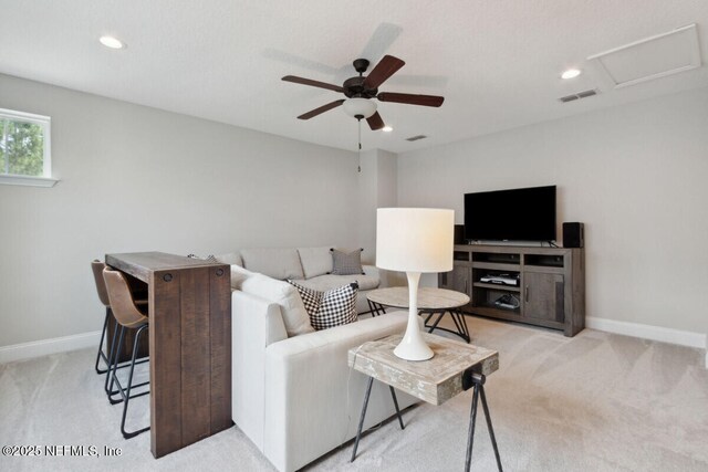250 Ponder Cir, Yulee, FL 32097 - living area with light carpet, ceiling fan, baseboards, and recessed lighting