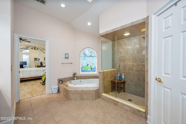 bathroom featuring connected bathroom, tile patterned floors, lofted ceiling, a shower stall, and a garden tub