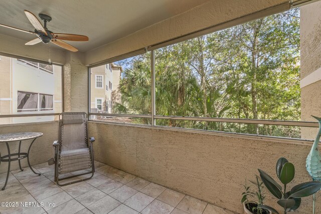 1701 The Greens Way Unit 1411, Jacksonville Beach, FL 32250 - balcony with a ceiling fan