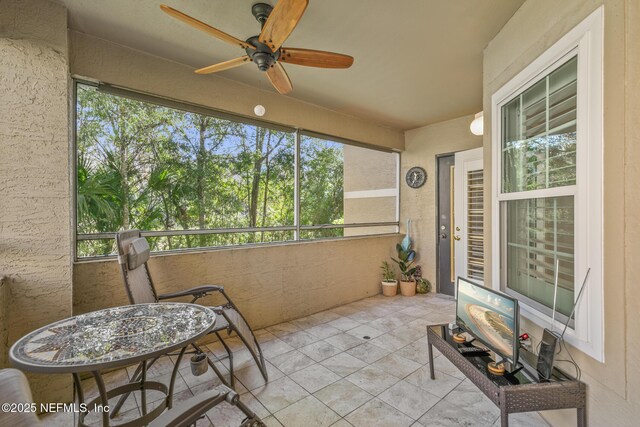 1701 The Greens Way Unit 1411, Jacksonville Beach, FL 32250 - sunroom with a ceiling fan