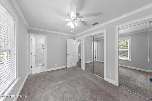 1823 Mauva Juan Ave, Jacksonville, FL 32225 - unfurnished bedroom with carpet, multiple closets, baseboards, connected bathroom, and a ceiling fan