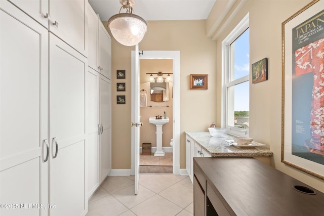 1846 Margaret St Unit 7C, Jacksonville, FL 32204 - corridor featuring light tile patterned floors and baseboards