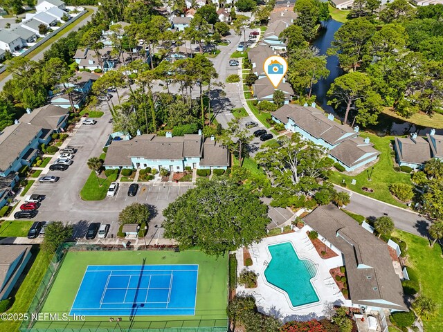 705 Marsh Cove Pl, Ponte Vedra Beach, FL 32082 - aerial view of property and surrounding area with nearby suburban area, a pool, and a nearby body of water