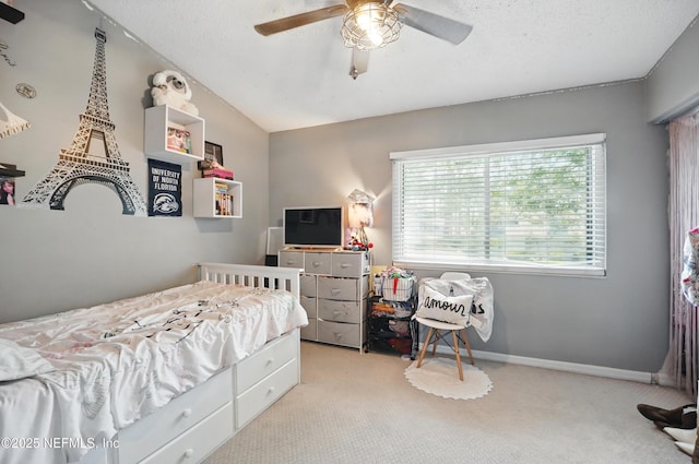 705 Marsh Cove Pl, Ponte Vedra Beach, FL 32082 - bedroom with carpet flooring, vaulted ceiling, a ceiling fan, baseboards, and a textured ceiling