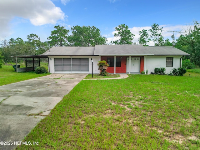 23063 SW Edgewater Blvd, Dunnellon, FL 34431 - ranch-style home featuring a garage, driveway, a front lawn, and stucco siding