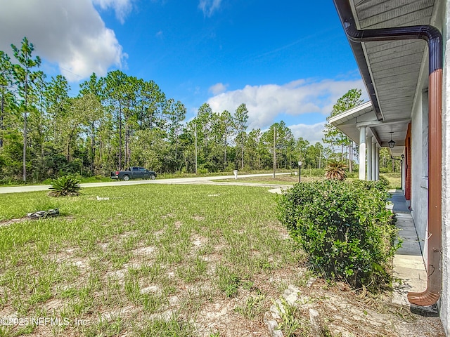 23063 SW Edgewater Blvd, Dunnellon, FL 34431 - view of grassy yard featuring view of scattered trees