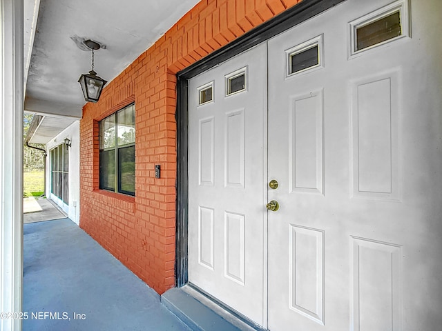 23063 SW Edgewater Blvd, Dunnellon, FL 34431 - entrance to property with brick siding and a porch