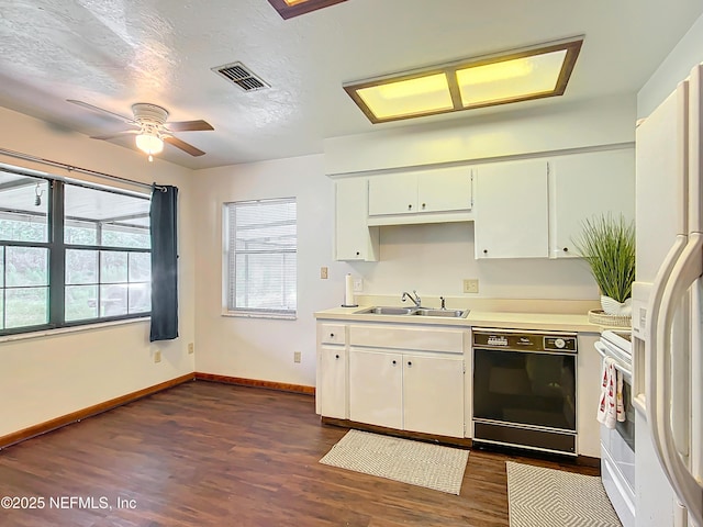 23063 SW Edgewater Blvd, Dunnellon, FL 34431 - kitchen with white appliances, a sink, dark wood-style floors, baseboards, and ceiling fan