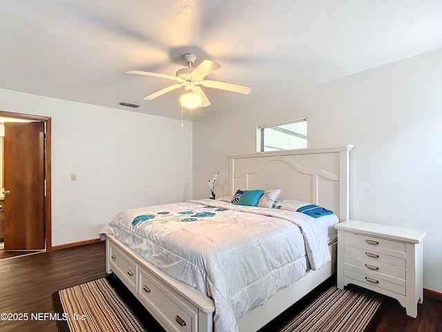 23063 SW Edgewater Blvd, Dunnellon, FL 34431 - bedroom featuring dark wood-style floors, baseboards, and a ceiling fan