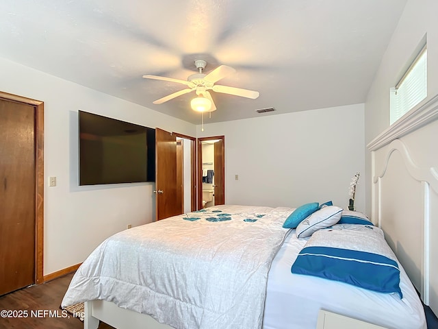 23063 SW Edgewater Blvd, Dunnellon, FL 34431 - bedroom with dark wood-style flooring and a ceiling fan