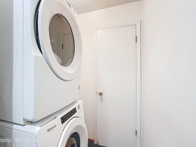23063 SW Edgewater Blvd, Dunnellon, FL 34431 - laundry room featuring stacked washer / drying machine