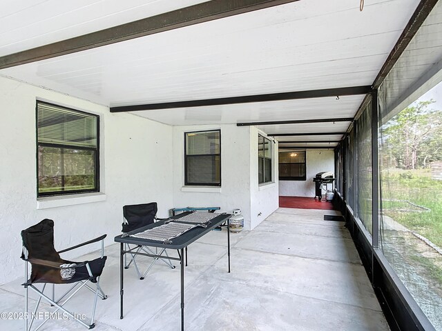 23063 SW Edgewater Blvd, Dunnellon, FL 34431 - sunroom / solarium featuring beamed ceiling