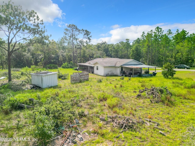 23063 SW Edgewater Blvd, Dunnellon, FL 34431 - view of yard with a wooded view