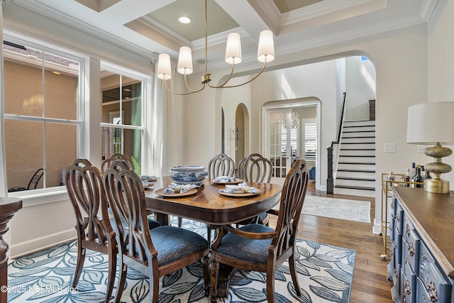 361 Amalurra Trl, Saint Johns, FL 32259 - dining area featuring coffered ceiling, arched walkways, crown molding, dark wood-style floors, and beam ceiling