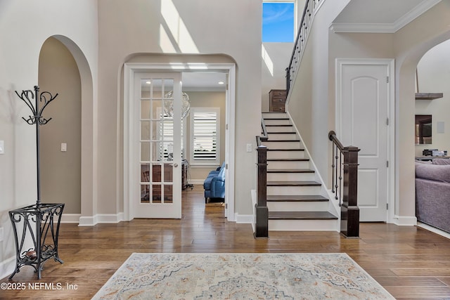 361 Amalurra Trl, Saint Johns, FL 32259 - entryway with arched walkways, hardwood / wood-style flooring, stairs, ornamental molding, and baseboards