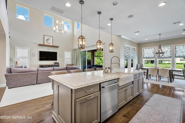 361 Amalurra Trl, Saint Johns, FL 32259 - kitchen with dishwasher, a chandelier, a sink, a textured ceiling, and dark wood finished floors