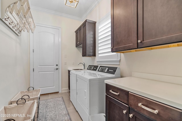 361 Amalurra Trl, Saint Johns, FL 32259 - laundry area with cabinet space, washing machine and clothes dryer, crown molding, light tile patterned floors, and baseboards