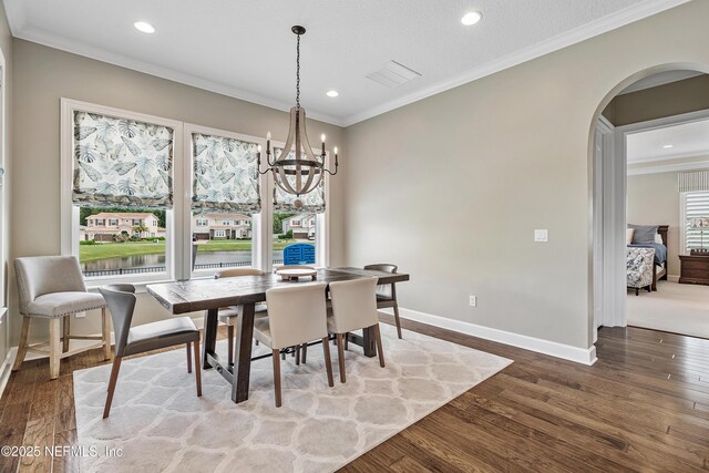 361 Amalurra Trl, Saint Johns, FL 32259 - dining room with wood finished floors, arched walkways, baseboards, ornamental molding, and recessed lighting