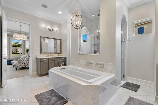 361 Amalurra Trl, Saint Johns, FL 32259 - ensuite bathroom featuring crown molding, a shower stall, baseboards, a garden tub, and vanity
