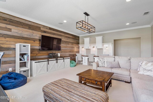 361 Amalurra Trl, Saint Johns, FL 32259 - living room featuring crown molding, recessed lighting, wooden walls, carpet, and a chandelier