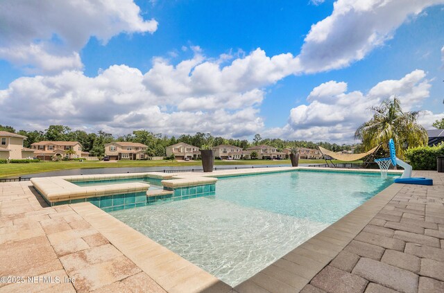 361 Amalurra Trl, Saint Johns, FL 32259 - view of swimming pool with a pool with connected hot tub and a residential view