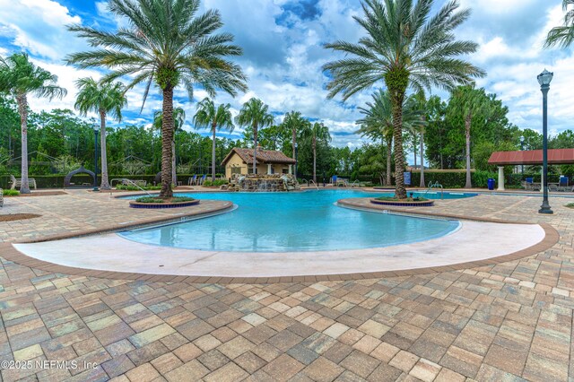 361 Amalurra Trl, Saint Johns, FL 32259 - community pool featuring a patio and view of scattered trees