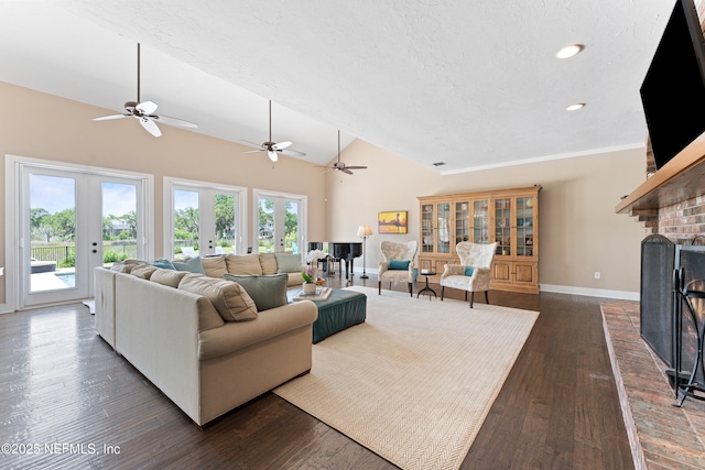 24544 Deer Trace Dr, Ponte Vedra Beach, FL 32082 - living area featuring vaulted ceiling, dark wood-style floors, healthy amount of natural light, baseboards, and ceiling fan