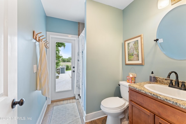 24544 Deer Trace Dr, Ponte Vedra Beach, FL 32082 - full bathroom with wood finished floors, a shower with shower curtain, and vanity