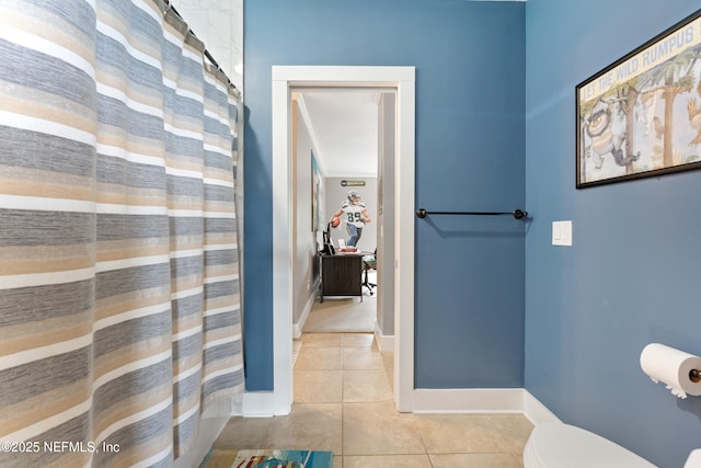 24544 Deer Trace Dr, Ponte Vedra Beach, FL 32082 - full bathroom featuring tile patterned flooring, toilet, baseboards, and curtained shower