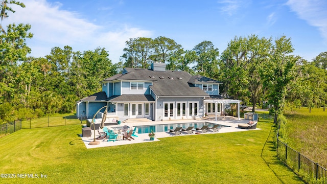 24544 Deer Trace Dr, Ponte Vedra Beach, FL 32082 - back of property featuring french doors, a patio, a pergola, view of scattered trees, and a chimney