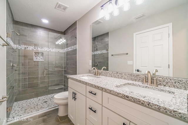409 Willow Branch Ave, Jacksonville, FL 32254 - full bathroom with a stall shower, double vanity, wood finished floors, and recessed lighting