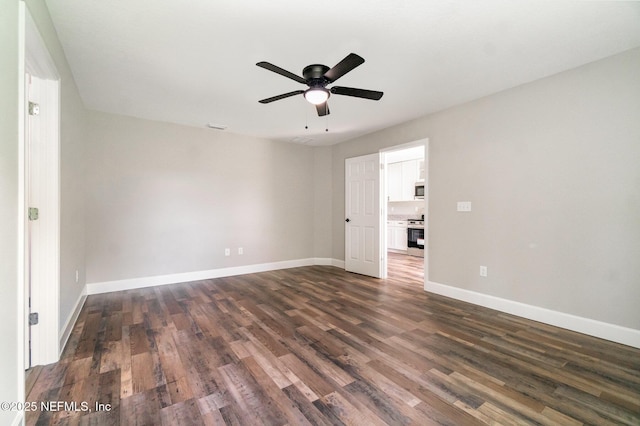409 Willow Branch Ave, Jacksonville, FL 32254 - spare room featuring dark wood-style flooring and ceiling fan