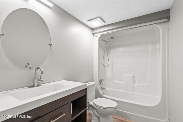 7142 Cypress Cove Rd Unit 39, Jacksonville, FL 32244 - full bath featuring a textured ceiling, tub / shower combination, toilet, and vanity