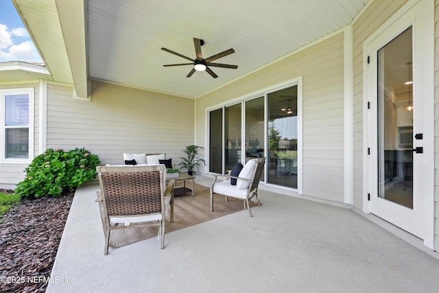 view of patio with ceiling fan and an outdoor hangout area