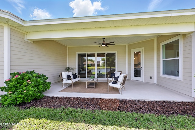 view of patio / terrace featuring a ceiling fan and an outdoor living space