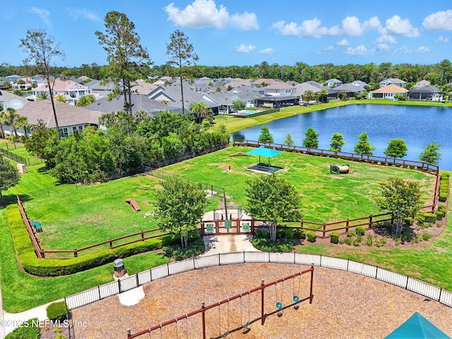 surrounding community with a residential view and a water view