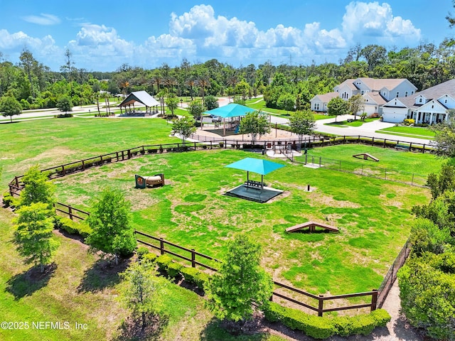 bird's eye view of a tree filled landscape and a recreational park