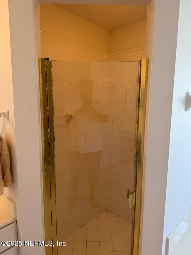 bathroom featuring a stall shower